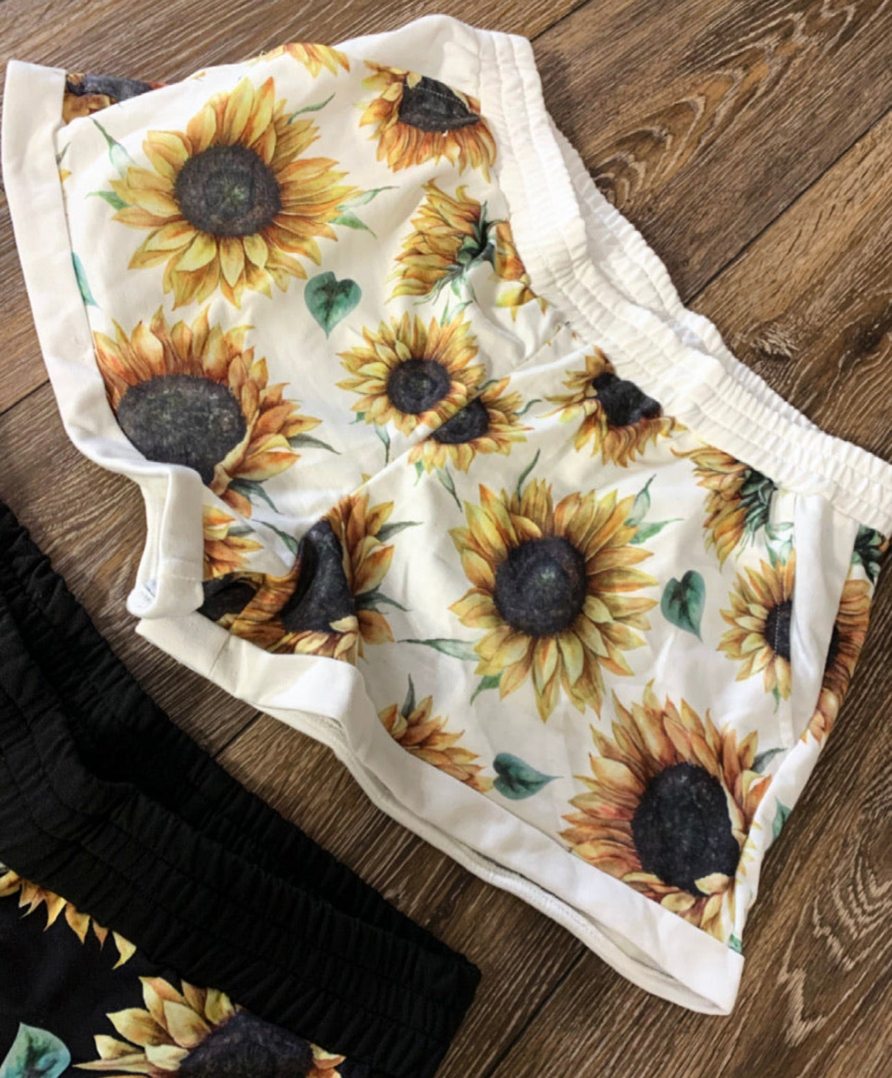 White sunflower shorts
