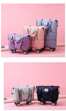 Travel wheel duffle bags