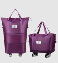 Travel wheel duffle bags
